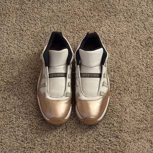 Air Jordan 11 low Gold mens
